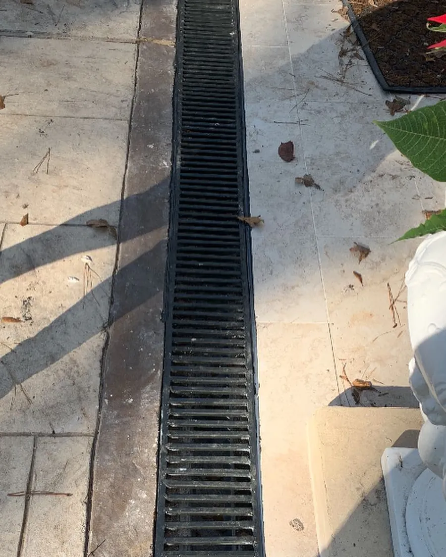 Channel drain set into a concrete patio